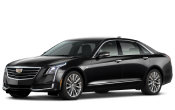 A sleek black saloon car for comfortable airport transfers.